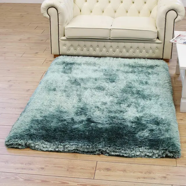plush_rug_ocean_colour_next_to_cream_chair__00040__52780__52795