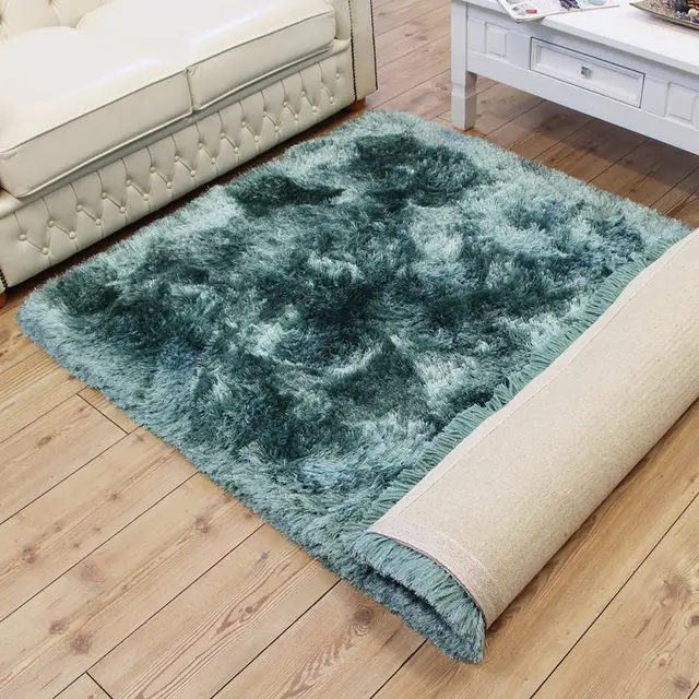plush_rug_ocean_colour_rolled_over_to_show_backing__29478__69774__41047