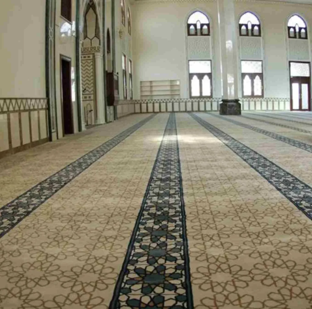 Traditional mosque prayer carpet rows