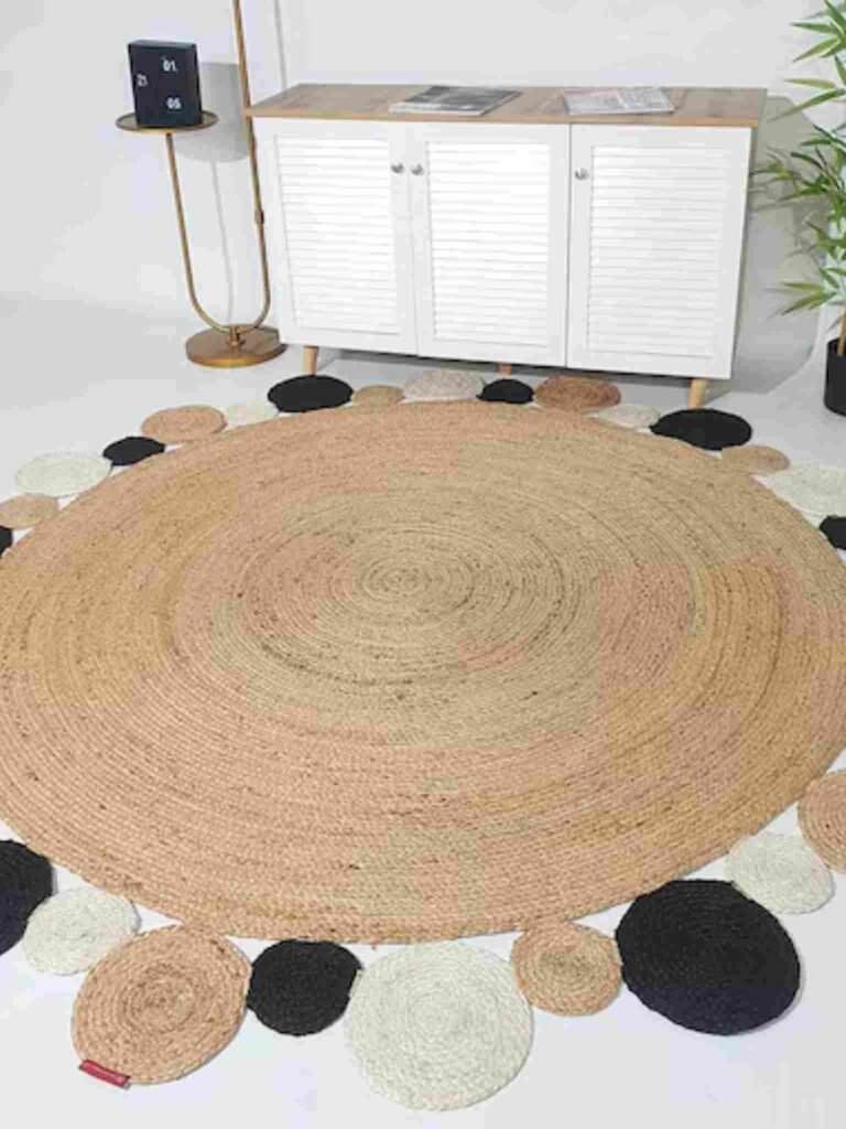 Round woven rug with dot border